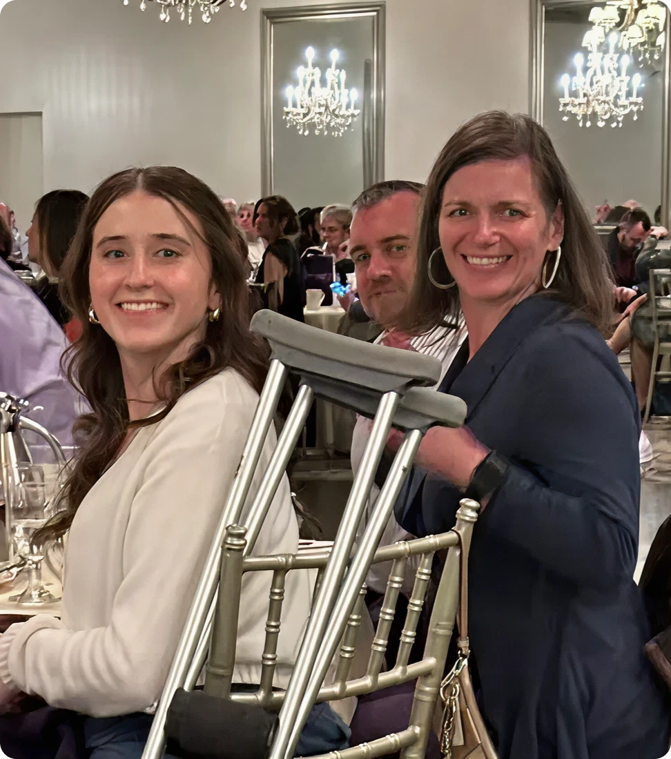Smiling people at a formal event